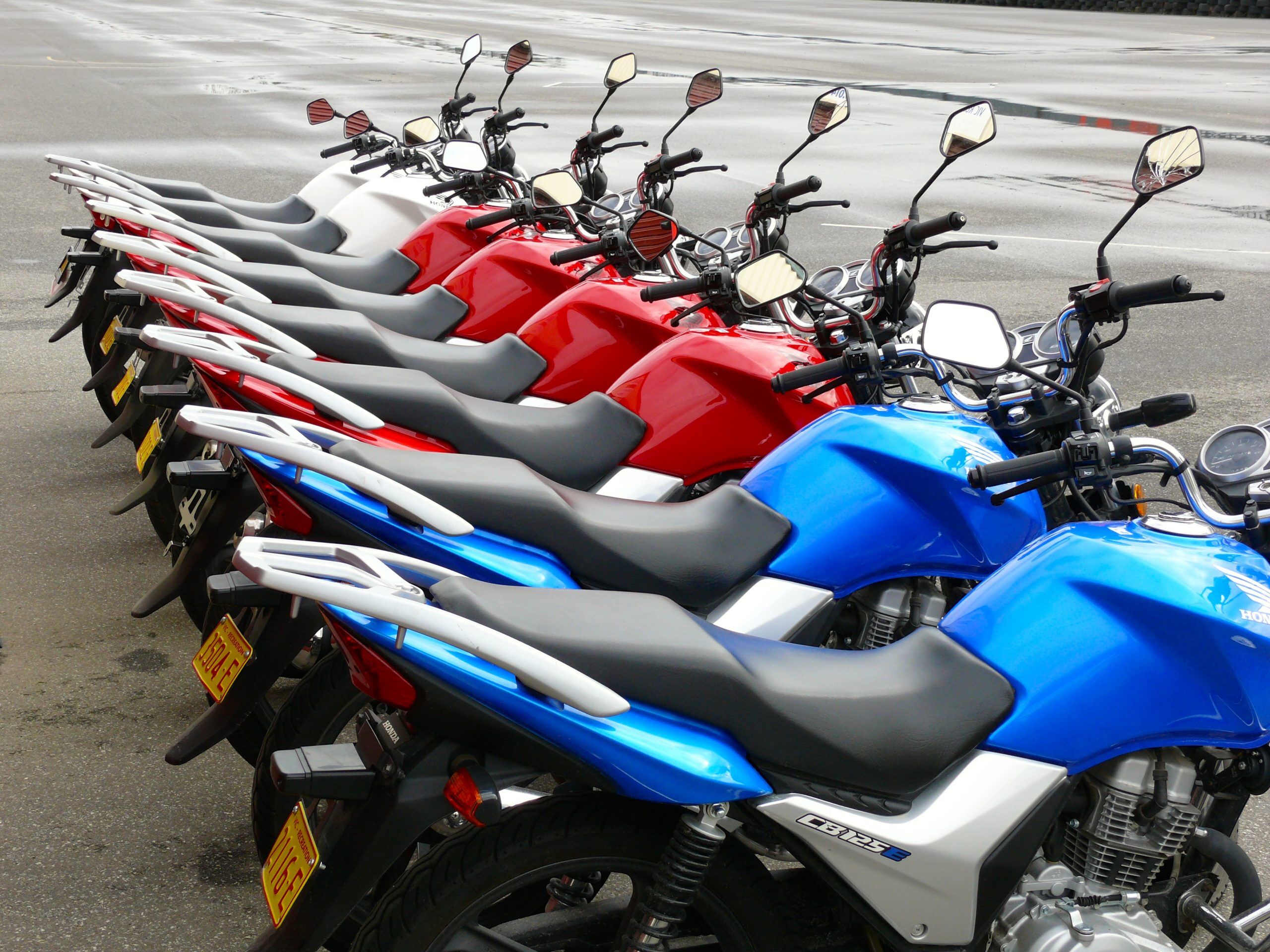 A collection of motorcycle bikes in the beach